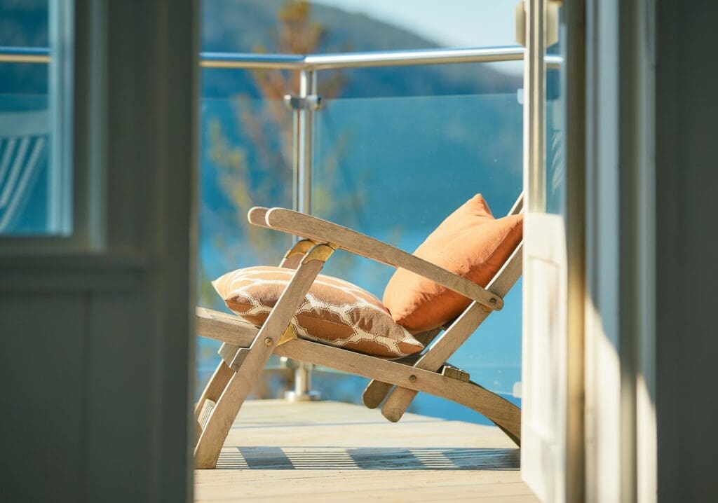 Lounge chair with cushions on balcony