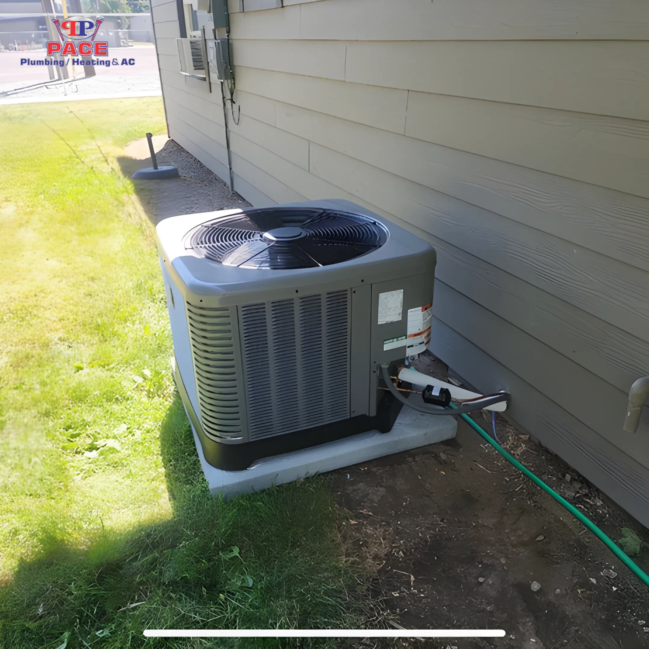 Air conditioning unit beside house